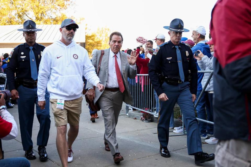 Alabama’s Nick Saban walks to the stadium before Saturday’s game against Kentucky at Kroger Field. Saban is now 9-0 in his head coaching career against UK.