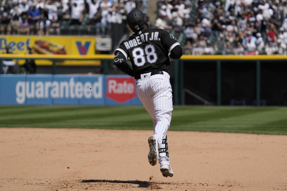 Chicago White Sox's Luis Robert Jr., rounds the bases after hitting a solo home run during the fourth inning of a baseball game against the Kansas City Royals in Chicago, Sunday, May 21, 2023. (AP Photo/Nam Y. Huh)