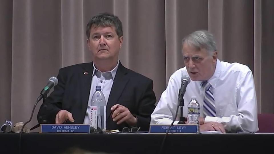 Moore County school board members David Hensley and Robert Levy at a April 2023 meeting where they adopted a local “Parents’ Bill of Rights” policy. That policy is now being challenged in a federal Title IX complaint.