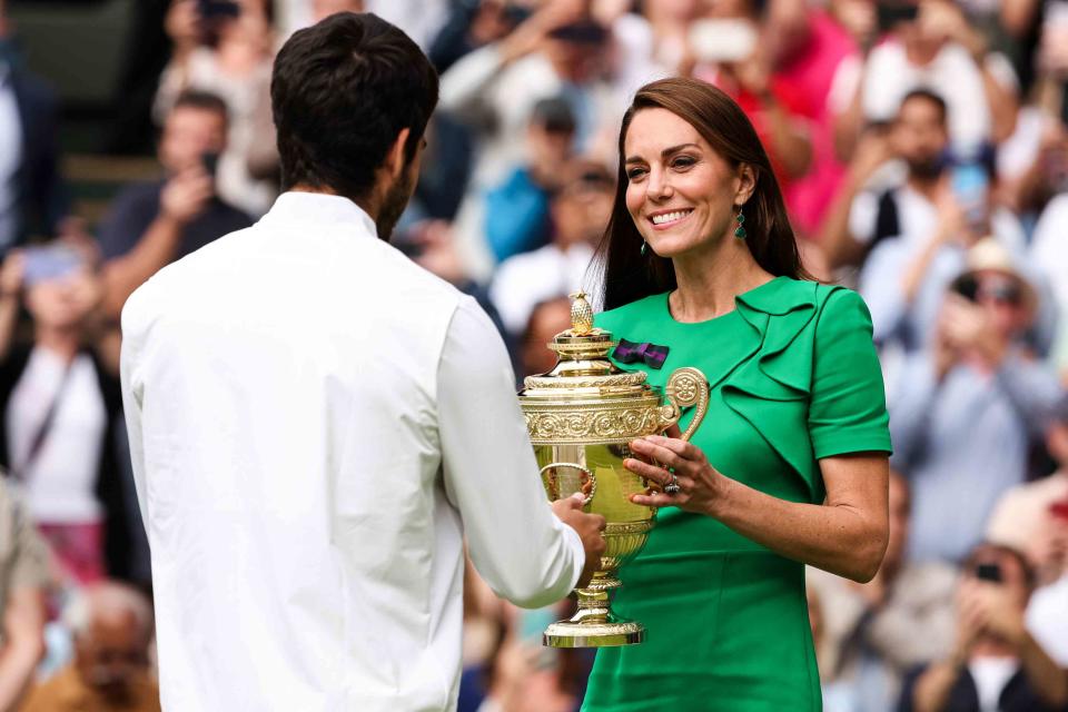 <p>Shi Tang/Getty </p> Carlos Alcaraz and Kate Middleton at Wimbledon on July 16