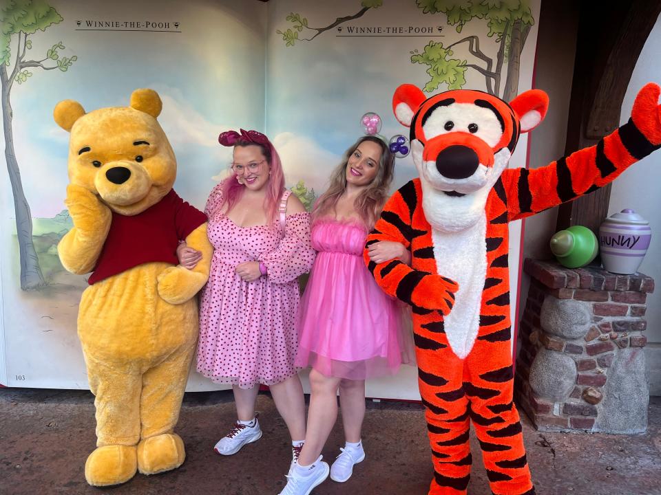 Casey Clark and Jenna Clark with Pooh and Tigger