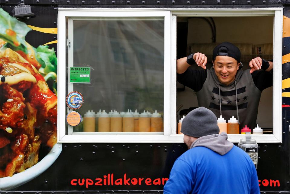 Cupzilla food truck's menu features Korean BBQ chicken, pork or tofu cups served with rice, noodles and veggies.