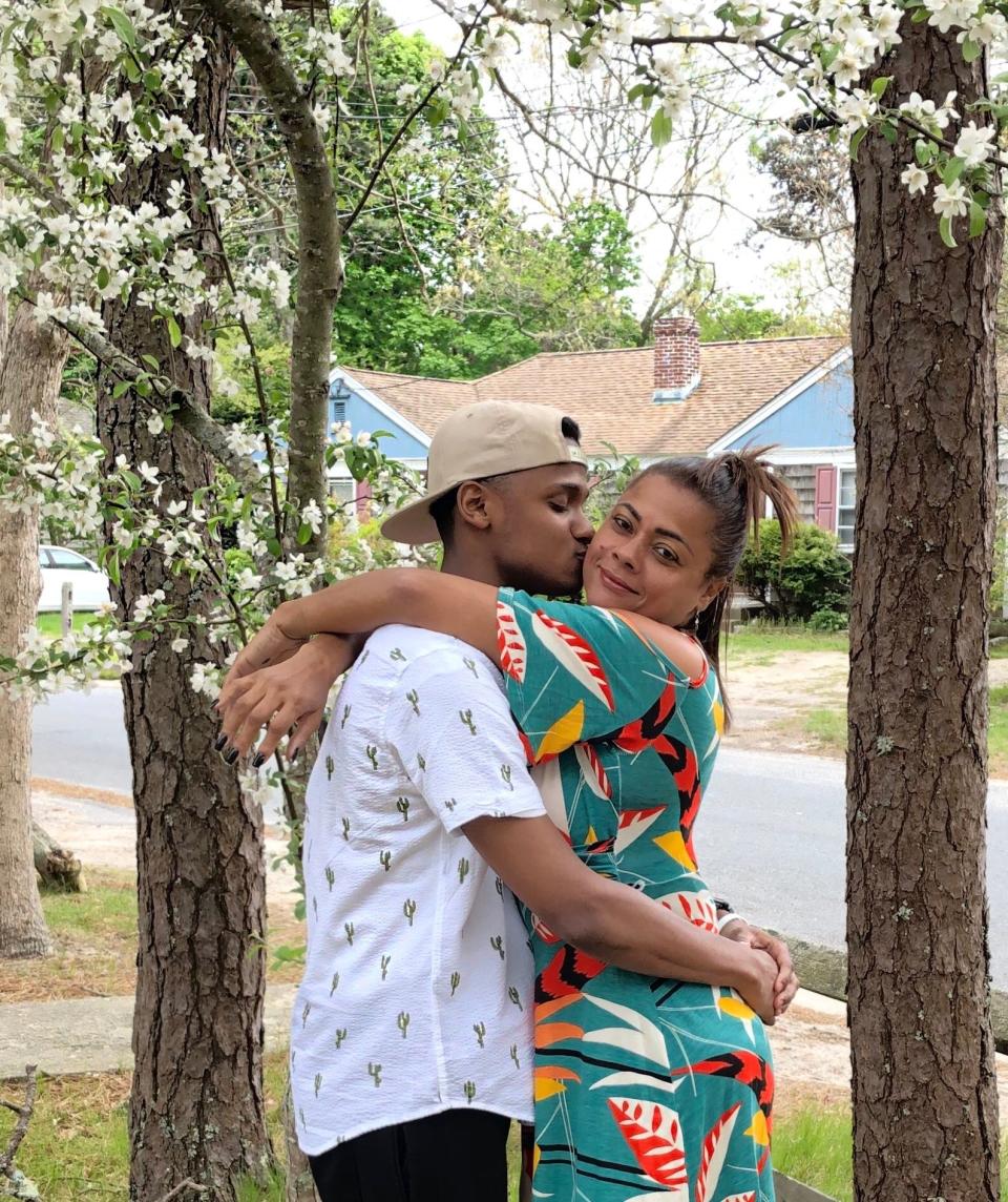 Thalles De Souza and his mother, Mauriceia De Souza, at their West Yarmouth house in 2019.