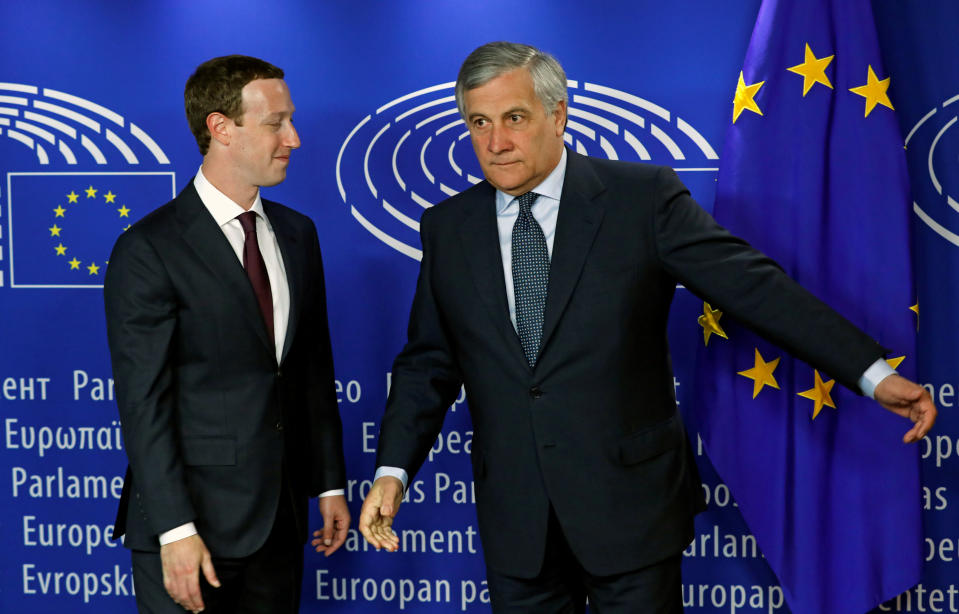 Facebook CEO Mark Zuckerberg gets a cold welcome from European Parliament President Antonio Tajani (Reuters)