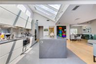 <p>Skylights help flood the vast open-plan kitchen-cum-diner-cum-living room with natural light. </p>