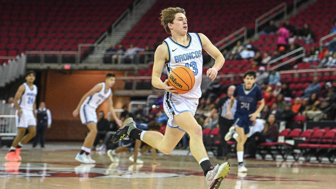 Clovis North’s Max Landon charges downcourt on a fast break before scoring against Bullard in the championship game of Valley Children’s Tip-Off Invitational at the Save Mart Center on Saturday, Dec. 3, 2022. Clovis North defeated Bullard 75-54.