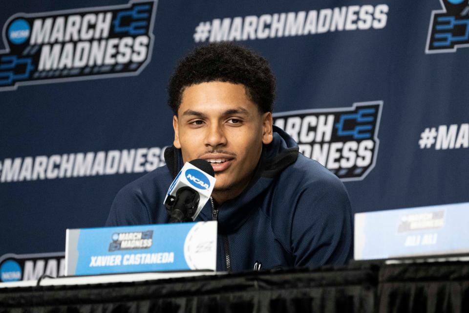 Akron Zips guard Xavier Castaneda answers questions from reporters during a press conference at Moda Center in Portland, March 16, 2022.