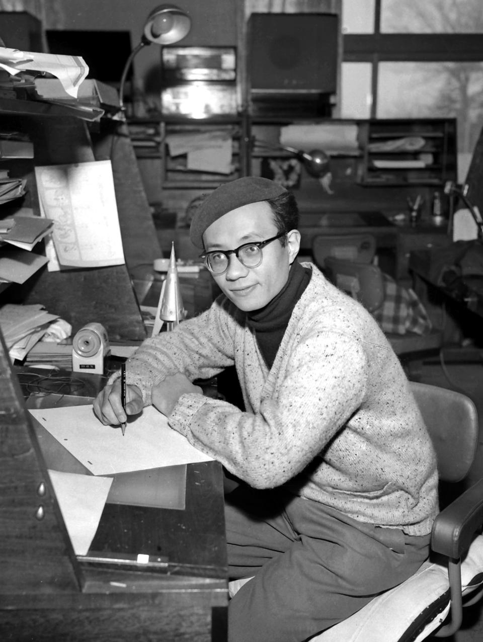 TOKYO, JAPAN - DECEMBER 28: Catoonist Osamu Tezuka poses on December 28, 1962 in Tokyo, Japan. (Photo by Sankei/Getty Images)