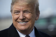 President Donald Trump speaks with reporters as he boards Air Force One as he departs Tuesday, Feb. 18, 2020, at Andrews Air Force Base, Md.(AP Photo/Alex Brandon)