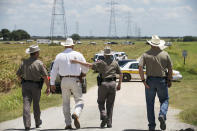 <p>Authorities arrive on the scene of a hot air balloon crash, July 30, 2016 near Lockhart, Texas. (Ralph Barrera/Austin American-Statesman via AP)</p>