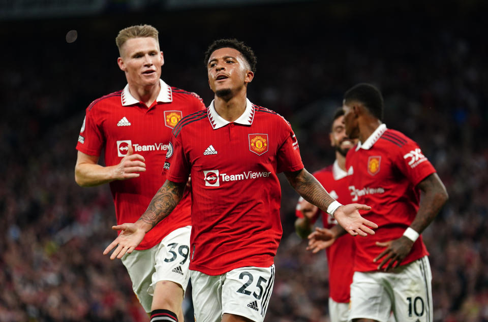 Seen here, Manchester United's Jadon Sancho celebrates his opening goal against Liverpool.