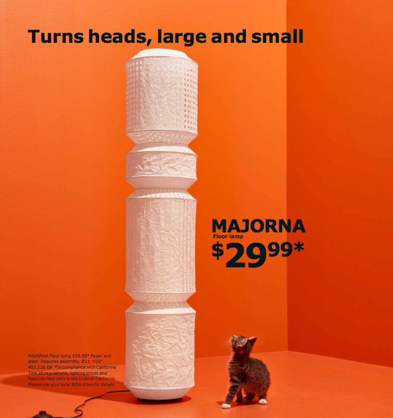 IKEA sees your teeny tabletop paper lantern and raises you a paper lantern tower plus a kitten.