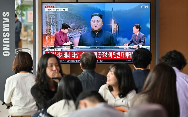 A television broadcast with file footage of North Korea's leader Kim Jong Un in Seoul in May 2023 (Jung Yeon-je)