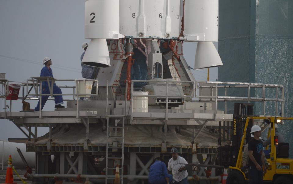 Technicians make last minute preparations before the launch of the United Launch Alliance Delta II rocket with the Orbiting Carbon Observatory-2 (OCO-2) satellite onboard, at the Vandenberg Air Force Base, California June 30, 2014. (REUTERS/Gene Blevins)