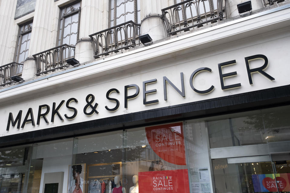 With retail sales suffering due to the Coronavirus pandemic, clothing store Marks & Spencer has announced 7000 job losses in the coming months, as people wearing face masks pass a sign outside their shop in the city centre on 18th August 2020 in London, United Kingdom. M&S will cut the jobs over the next three months both in its stores and also management. (photo by Mike Kemp/In PIctures via Getty Images)