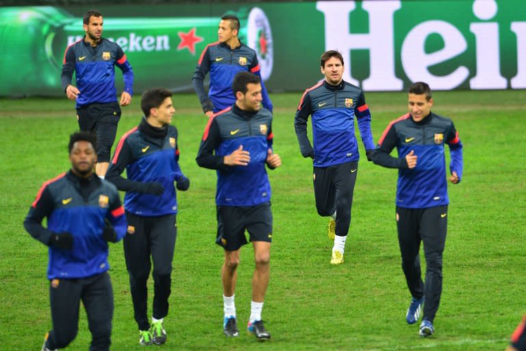 Barcelona train on the eve of their Champions League clash with AC Milan, on February 19, 2013, at the San Siro. Barca travel to Milan without coach Tito Vilanova as he continues treatment in New York to help him recover from a throat cancer operation he underwent before Christmas