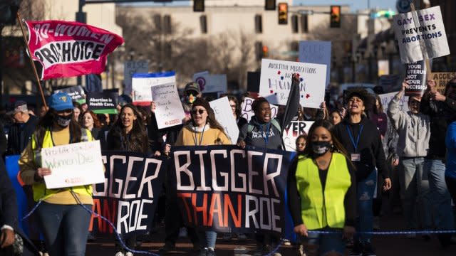 People march through downtown Amarillo to protest a lawsuit to ban the abortion drug mifepristone.