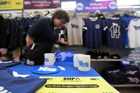 Merchandise for sale is displayed at the Scottish Nationalist Party (SNP) annual party conference in Perth November 15, 2014. REUTERS/Cathal McNaughton