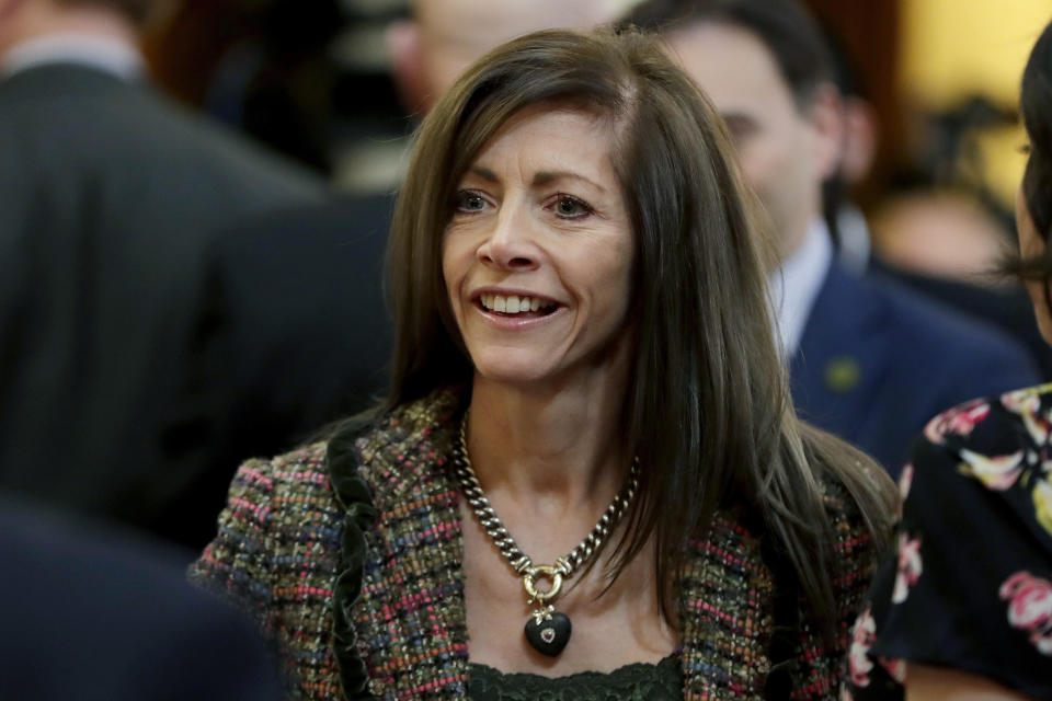 FILE - New Jersey first lady Tammy Murphy arrives at the Statehouse Assembly chambers prior to Gov. Phil Murphy's first State of the State address, Jan. 15, 2019, in Trenton, N.J. As Democratic Party leaders have called on Bob Menendez to resign amid a federal corruption case against him, a field of robust primary challengers has already emerged including Murphy and has begun to win significant support from county party officials. (AP Photo/Julio Cortez, File)