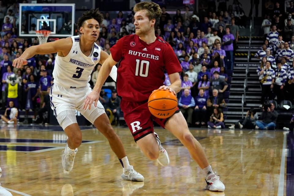 Northwestern Wildcats guard Ty Berry (3) defends Rutgers Scarlet Knights guard Cam Spencer (10) during the first half at Welsh-Ryan Arena.