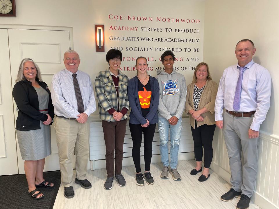 Headmaster David S. Smith, Assistant Headmaster Caryn Lasky, Assistant Headmaster Matthew Skidds, and Director of Student Services Jennifer Cox congratulate National Merit Scholarship Semifinalists Nikhil Chavda and John Zhang, and Commended Student Megan Adams. From Left to right are C. Lasky, D. Smith, J. Zhang, M. Adams, N. Chavda, J. Cox, and M. Skidds.