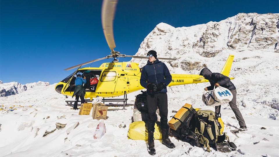 A helicopter on the Khumbu Glacier at base camp will return trekkers to Lukla