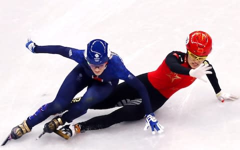 Jinyu Li of China and Elise Christie of Great Britain fall during the Short Track Speed Skating Ladies' 1500m Semifinals on day eight of the PyeongChang 2018 Winter Olympic Games at Gangneung Ice Arena on February 17, 2018 - Credit:  Getty Images 