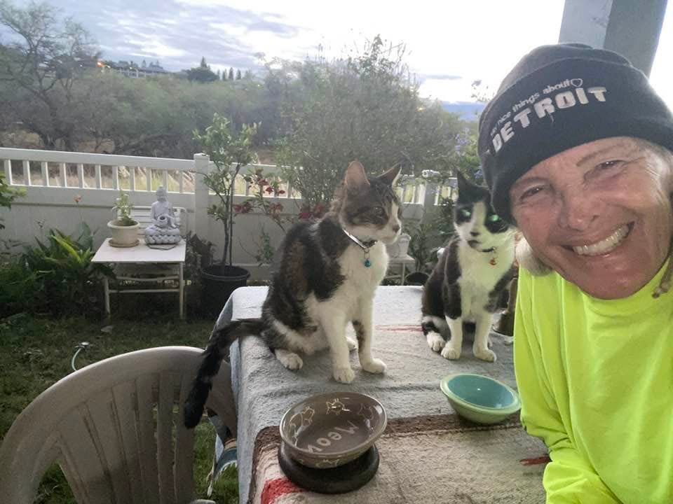 Emily Gail with cats, Pono Boy and Buddy Zen, in Hawaii.