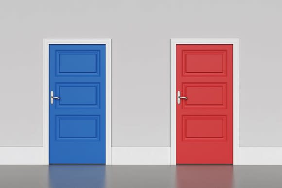 A wall with a blue door on the left and a red door on the right.