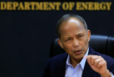 Philippine Department of Energy (DOE) Secretary Alfonso Cusi gestures during a Reuters interview at the DOE headquarters in Taguig city, Metro Manila, Philippines February 27, 2017. REUTERS/Romeo Ranoco