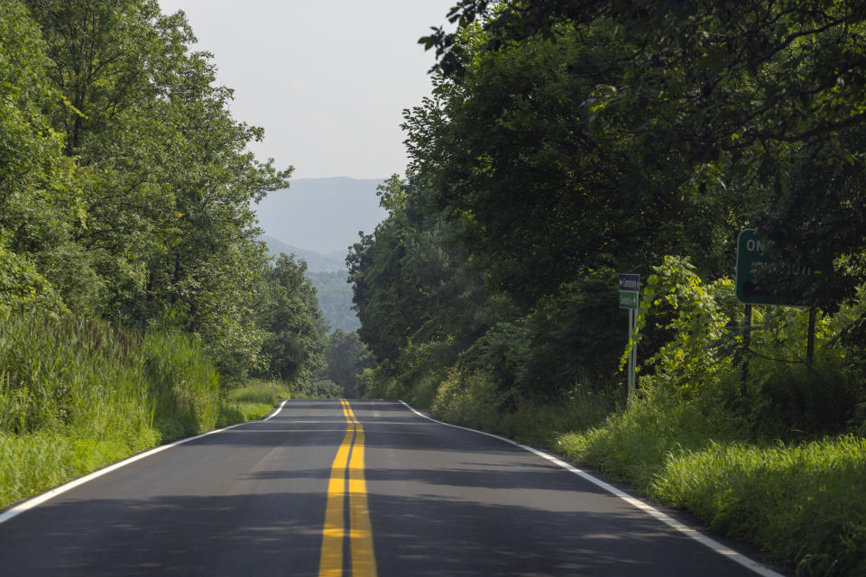 Rolling hills surround the Onondaga Nation Territory, Thursday, Aug. 3, 2023, in central New York. The Nation's territory once stretched more than 2 million acres. The present-day territory, just south of Syracuse, is approximately 7,300 acres. (AP Photo/Lauren Petracca)