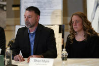 William Myre, and his wife Sheri, parents of Tate More, appear during a news conference in Southfield, Mich., Thursday, Jan. 27, 2022. A new lawsuit alleging negligence by school officials and a Michigan school shooting suspect's parents was filed over the attack at Oxford High School that killed four students and wounded six other students and a teacher. (AP Photo/Paul Sancya)