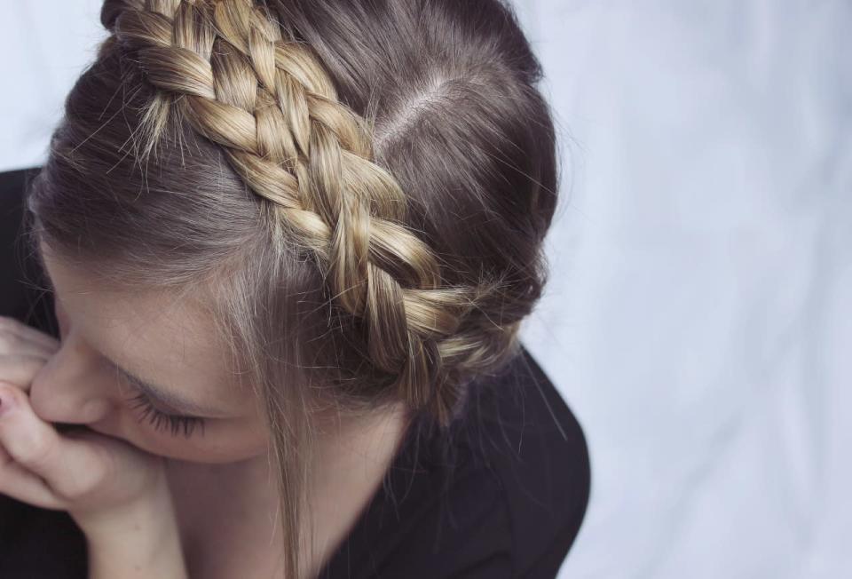 Feel like a Princess for a day by pinning plaits into a simple braid crown up-do.