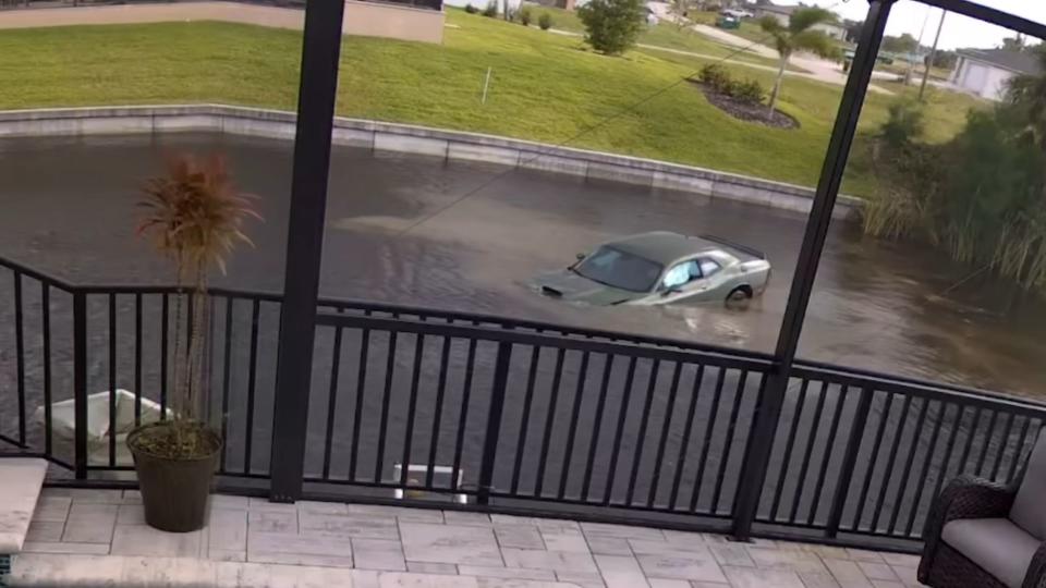 Street Racing Dodge Challenger Lands In Canal