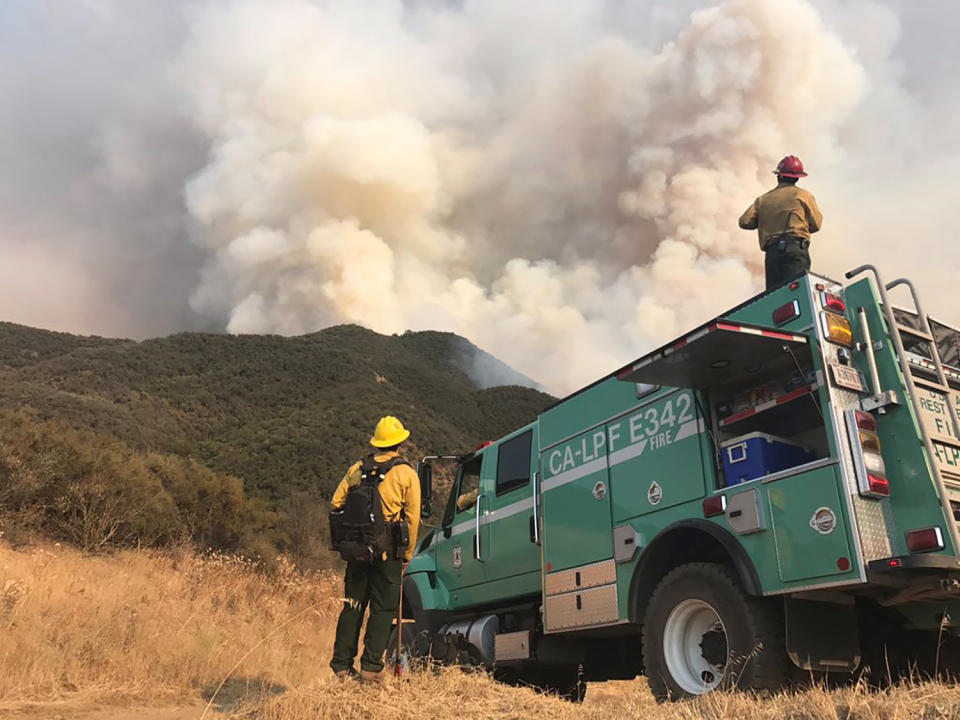 <p>Los Padres National Forest firefighters watch the northeast flank of the Whittier fire near Hot Spring Canyon outside Cachuma Lake, California, U.S. July 11, 2017. (Mike Eliason/Santa Barbara County Fire/Handout via Reuters) </p>