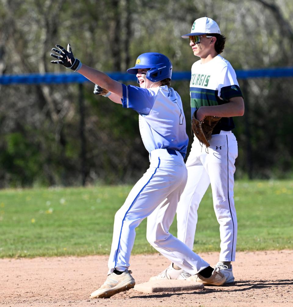Tyler Ross of St. John Paul II celebrates at second after hitting a three run double against Sturgis.
(Credit: Ron Schloerb/Cape Cod Times)
