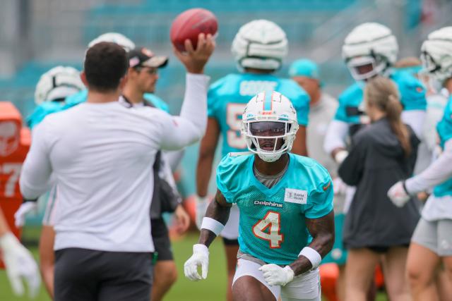 Miami Dolphins safety Jevon Holland, left, and cornerback Jalen