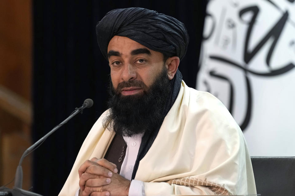 Zabiullah Mujahid, the spokesman for the Taliban government, gives a press conference in Kabul, Afghanistan, Sunday, Feb. 27, 2022. Mujahid said Taliban forces have arrested dozens of criminals, kidnappers and smugglers in operations across the capital Kabul, and welcomed a recent U.S. decision to ease restrictions on Afghan banks. (AP Photo/Hussein Malla)