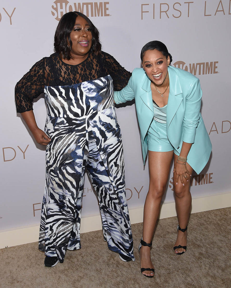 Loni Love and Tia Mowry at the Los Angeles premiere of “The First Lady” on April 14, 2022. - Credit: OConnor / AFF-USA.com / MEGA