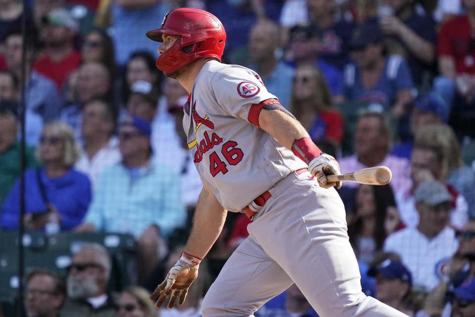 St. Louis Cardinals' Paul Goldschmidt watches his one-run single during the sixth inning in the first baseball game of a doubleheader against the Chicago Cubs in Chicago, Friday, Sept. 24, 2021. (AP Photo/Nam Y. Huh)