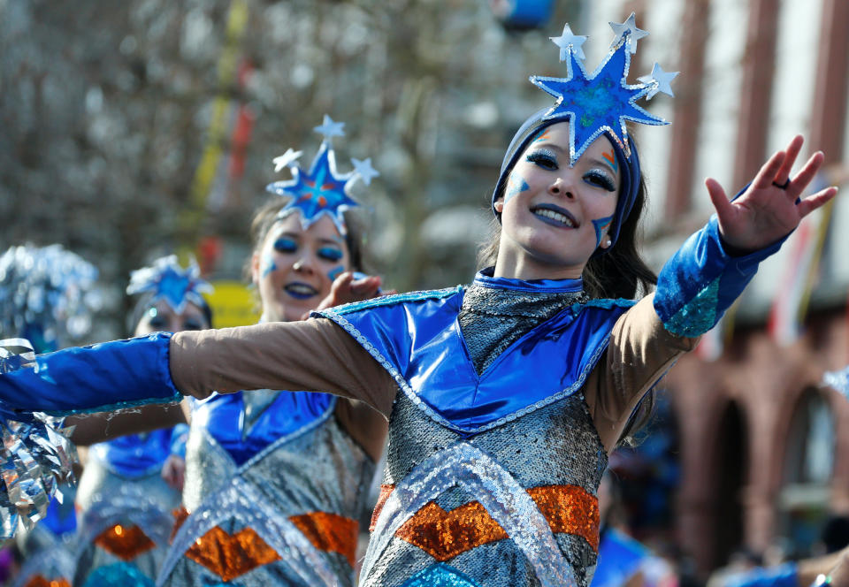 <p>Carnival revellers at the traditional “Rosenmontag” Rose Monday carnival parade in Mainz, Germany, Feb. 12, 2018. (Photo: Ralph Orlowski/Reuters) </p>