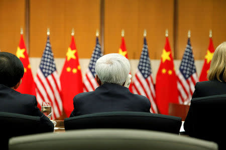 Delegates listen to opening remarks by China's State Councilor Yang Jiechi and U.S. REUTERS/Jonathan Ernst/ File Photo