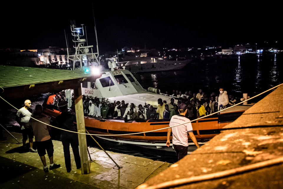 Lampedusa (italy), midnight between august 27h and 28th. Migrants rescued by the Italian Coast Guard disembark at the Favarolo peer. (Photo by Marco Panzetti/NurPhoto via Getty Images)