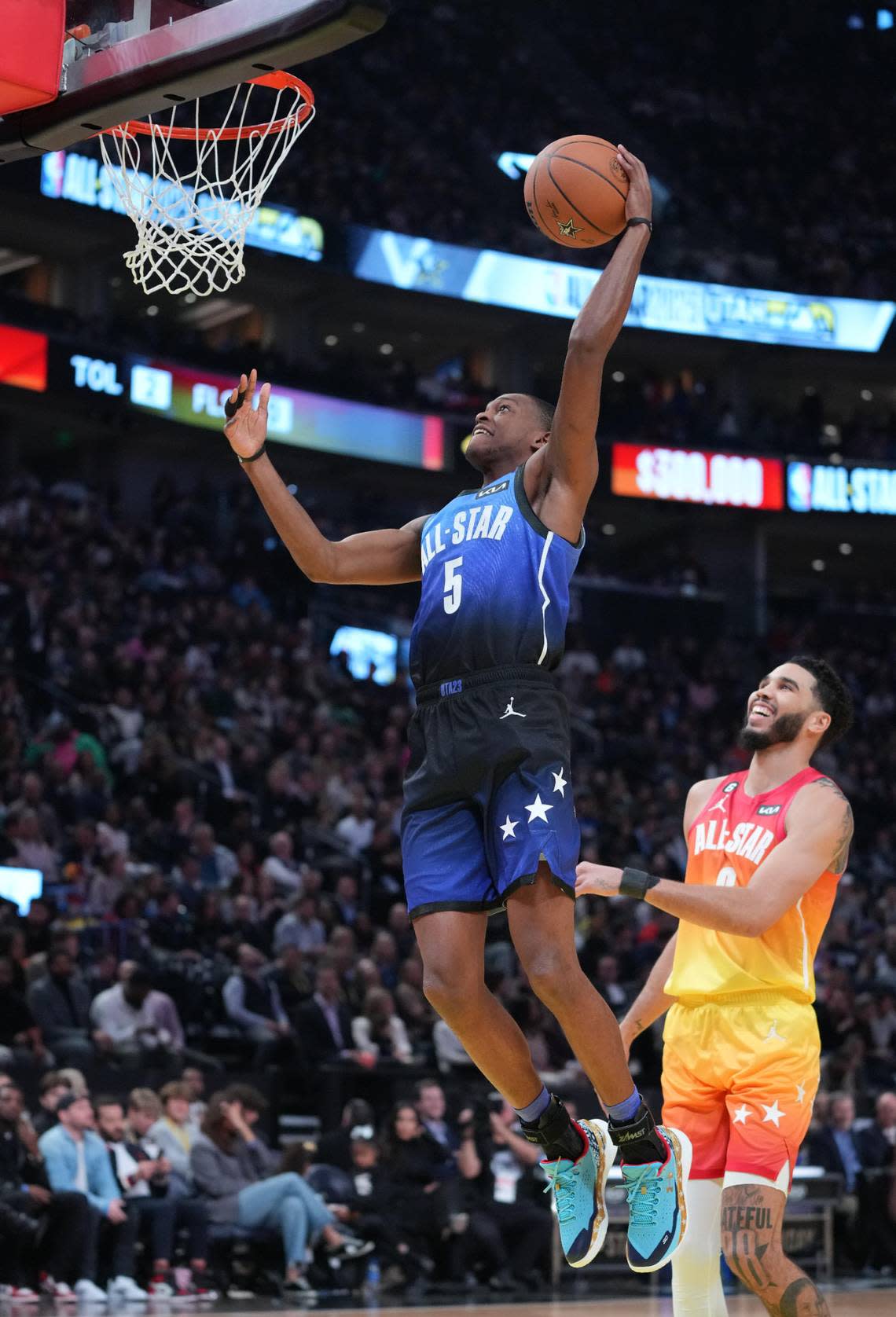 Team LeBron guard De’Aaron Fox (5) shoots against Team Giannis forward Jayson Tatum (0) in the 2023 NBA All-Star Game Feb. 19, 2023, at Vivint Arena in Salt Lake City, Utah.