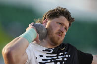 Ryan Crouser competes in the men's shot put during the U.S. track and field championships in Eugene, Ore., Sunday, July 9, 2023. (AP Photo/Ashley Landis)