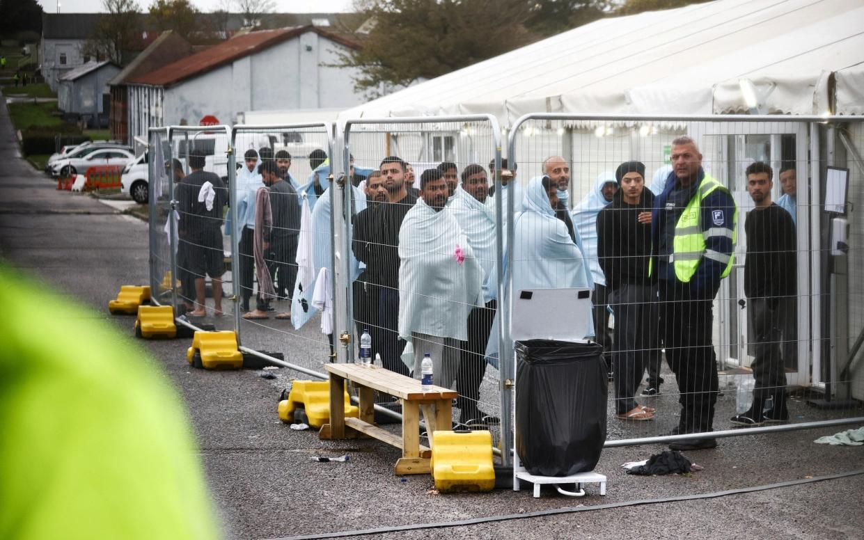 The Manston migrant processing centre saw the number of arrivals hit 4,000 in November - HENRY NICHOLLS/REUTERS