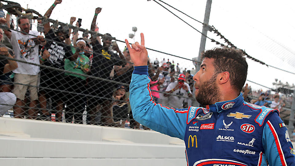 Seen here, Bubba Wallace greets motorsport spectators at Talladega.