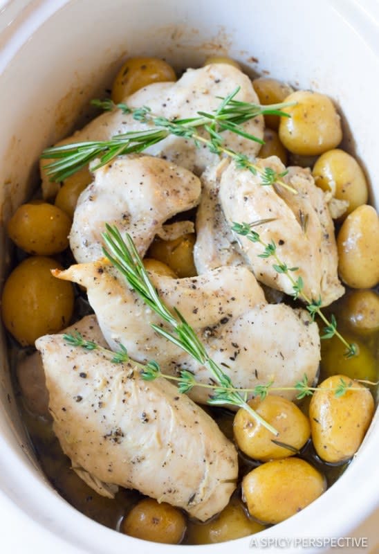 <p>You won't be able to resist the aroma or buttery garlic and herbs in this cozy dinner. Get this <a href="https://www.aspicyperspective.com/slow-cooker-garlic-butter-chicken-potatoes/" rel="nofollow noopener" target="_blank" data-ylk="slk:Slow Cooker Garlic Butter Chicken and Potatoes;elm:context_link;itc:0;sec:content-canvas" class="link ">Slow Cooker Garlic Butter Chicken and Potatoes</a> recipe!</p>