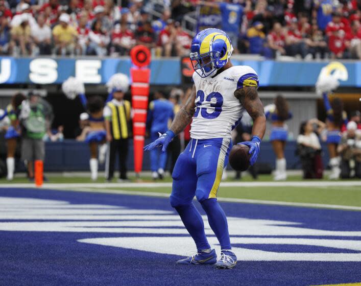 Rams running back Kyren Williams (23) does an end zone dance after scoring against the 49ers.
