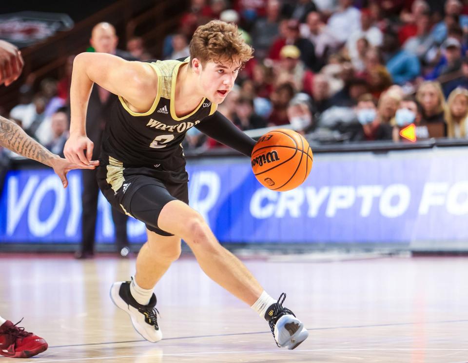 Wofford guard Max Klesmit drives against South Carolina during a game Nov. 23, 2001. Klesmit transferred to Wisconsin and was a graduate of Neenah High School.